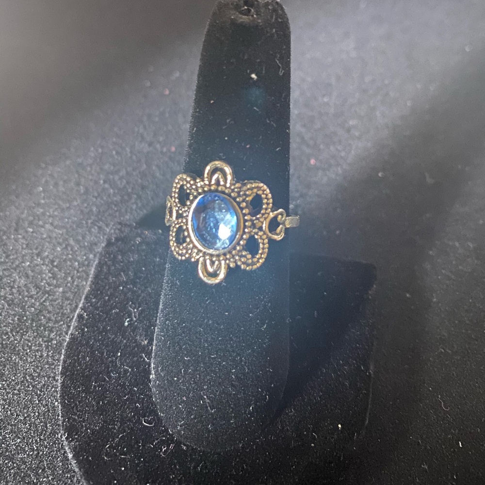 Blue topaz design ring